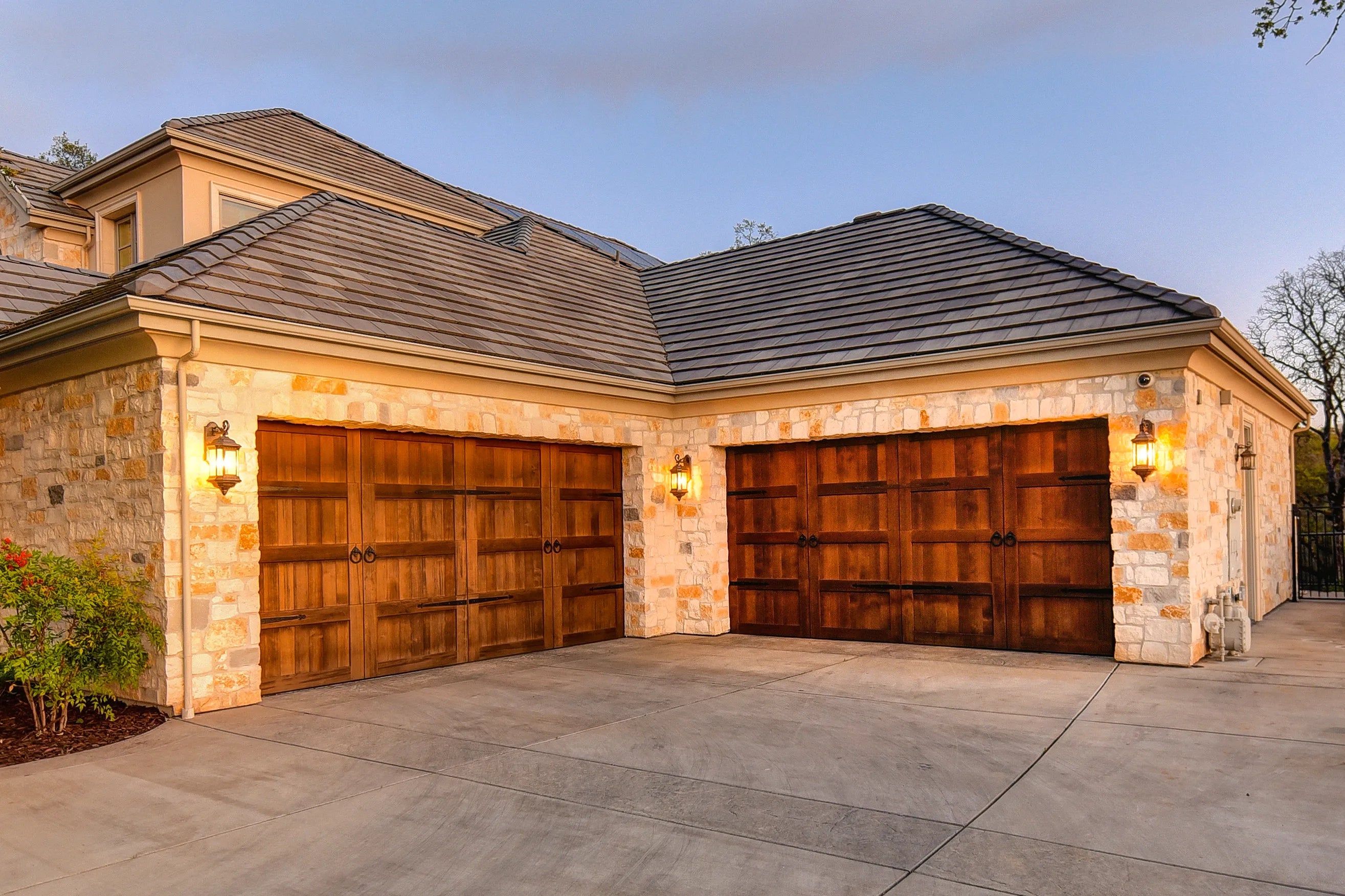 Beautiful wooden garage doors custom designed and hand built by Craft Doors USA