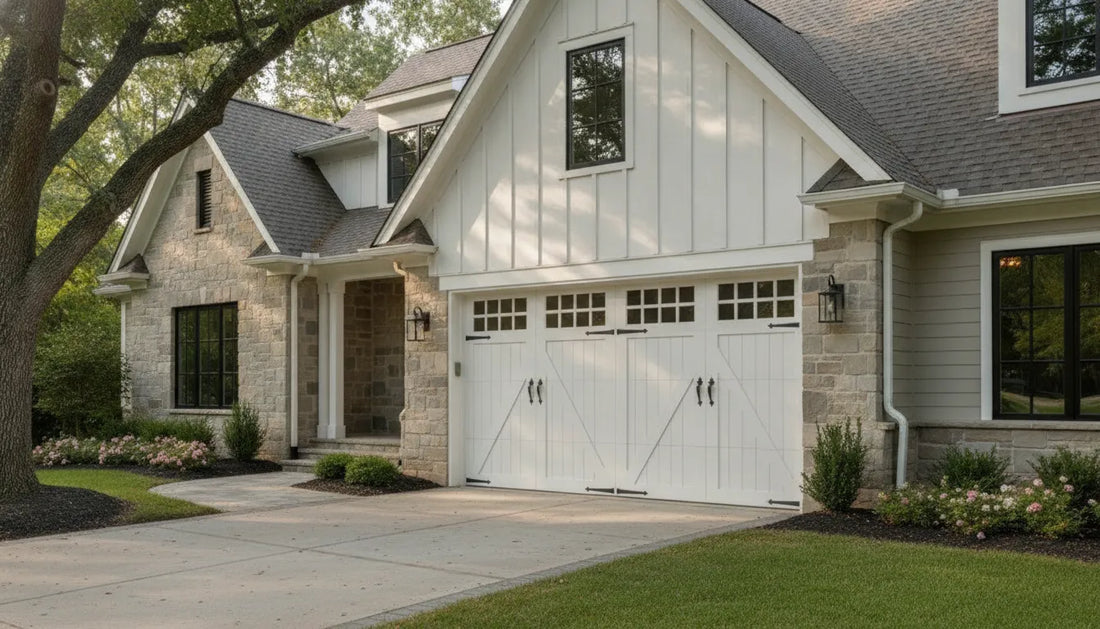 White custom wood garage door on a farmhouse-style home